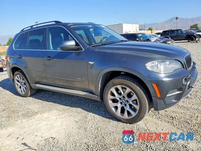 Czwarte zdjęcie samochodu z boku: 2013 BMW X5 XDRIVE35I VIN:5UXZV4C55D0B10976 - miniatura