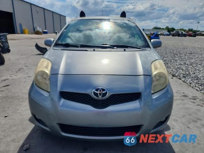 Piąte zdjęcie samochodu w środku: 2011 TOYOTA YARIS BASE VIN:JTDJT4K39B5339470 - miniatura