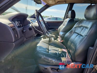 Zdjęcie 7 z 12 samochodu: 2001 JEEP GRAND CHEROKEE LIMITED VIN:1J4GW58N81C624357 - miniatura