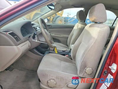Zdjęcie 7 z 13 samochodu: 2002 TOYOTA CAMRY LE VIN:JTDBE32K720038421 - miniatura