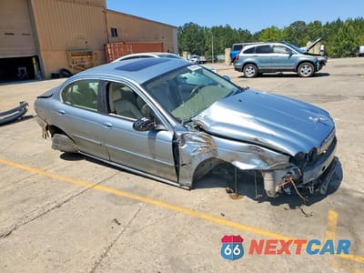 Czwarte zdjęcie samochodu z boku: 2005 JAGUAR X-TYPE 3.0 VIN:SAJWA51AX5WE61369 - miniatura