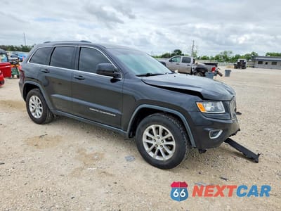 Czwarte zdjęcie samochodu z boku: 2016 JEEP GRAND CHEROKEE LAREDO VIN:1C4RJEAG5GC464682 - miniatura