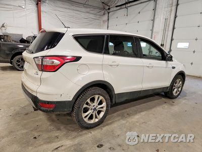 Trzecie zdjęcie samochodu z tyłu: 2017 FORD ESCAPE SE VIN:1FMCU9GD1HUC83264 - miniatura