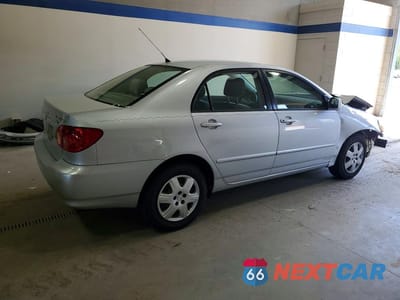 Trzecie zdjęcie samochodu z tyłu: 2006 TOYOTA COROLLA LE VIN:1NXBR32EX6Z657233 - miniatura