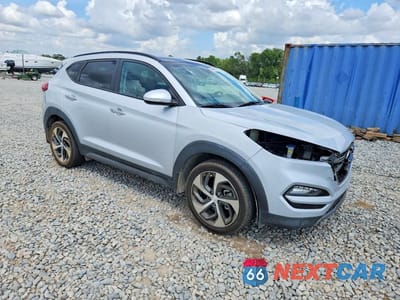 Czwarte zdjęcie samochodu z boku: 2016 HYUNDAI TUCSON LIMITED VIN:KM8J33A22GU201250 - miniatura