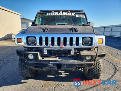 Piąte zdjęcie samochodu w środku: 2003 HUMMER H2 VIN:5GRGN23U13H107489 - miniatura