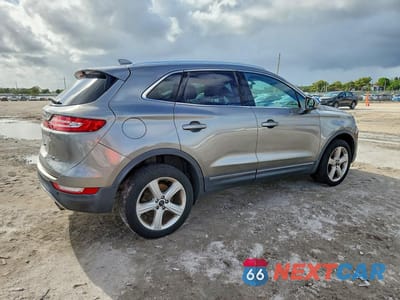 Trzecie zdjęcie samochodu z tyłu: 2017 LINCOLN MKC PREMIERE VIN:5LMCJ1D93HUL68372 - miniatura
