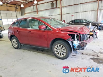 Czwarte zdjęcie samochodu z boku: 2010 MAZDA CX-7 VIN:JM3ER2W5XA0310384 - miniatura