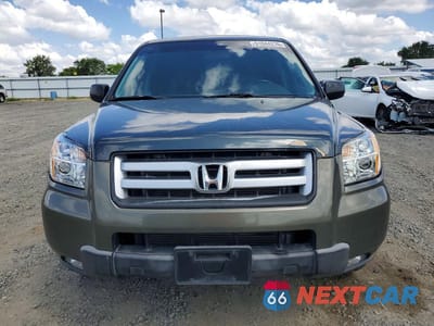 Piąte zdjęcie samochodu w środku: 2006 HONDA PILOT EX VIN:2HKYF18716H553678 - miniatura
