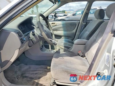 Zdjęcie 7 z 11 samochodu: 2001 TOYOTA COROLLA LE VIN:1NXBR12E01Z501263 - miniatura