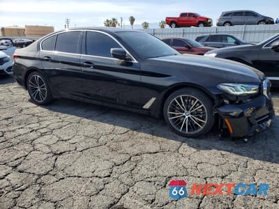 Czwarte zdjęcie samochodu z boku: 2021 BMW 530E VIN:WBA13AG02MCF46245 - miniatura