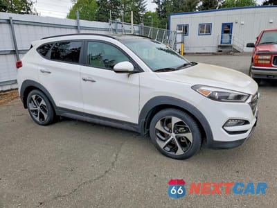 Czwarte zdjęcie samochodu z boku: 2016 HYUNDAI TUCSON LIMITED VIN:KM8J3CA27GU098200 - miniatura