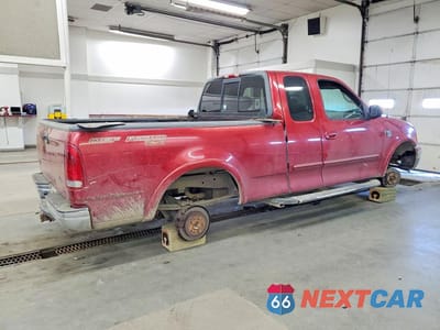Trzecie zdjęcie samochodu z tyłu: 2001 FORD F150 VIN:2FTRX18L61CA30766 - miniatura