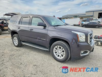 Czwarte zdjęcie samochodu z boku: 2018 GMC YUKON SLT VIN:1GKS2BKCXJR277083 - miniatura