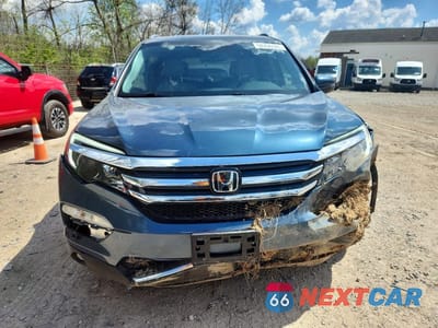 Piąte zdjęcie samochodu w środku: 2017 HONDA PILOT ELITE VIN:5FNYF6H0XHB041290 - miniatura