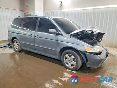 Czwarte zdjęcie samochodu z boku: 2001 HONDA ODYSSEY EX VIN:2HKRL18671H556419 - miniatura