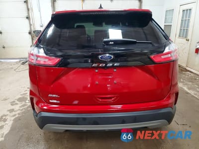 Zdjęcie 6 z 13 samochodu: 2021 FORD EDGE SEL VIN:2FMPK3J9XMBA23826 - miniatura