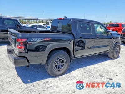 Trzecie zdjęcie samochodu z tyłu: 2026 NISSAN FRONTIER PRO-4X VIN:1N6ED1EK7TN633366 - miniatura