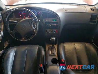 Zdjęcie 8 z 12 samochodu: 2003 HYUNDAI ELANTRA GT VIN:KMHDN55D63U089710 - miniatura