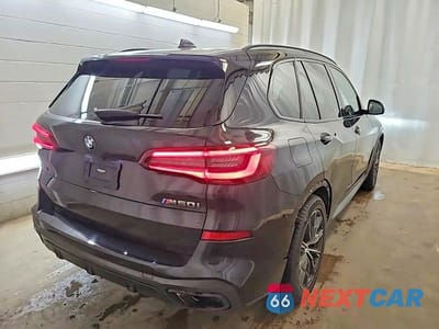 Czwarte zdjęcie samochodu z boku: 2021 BMW X5 M50I VIN:5UXJU4C01M9F71043 - miniatura