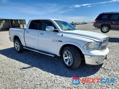 Czwarte zdjęcie samochodu z boku: 2014 RAM 1500 LARAMIE VIN:1C6RR7NM8ES389622 - miniatura