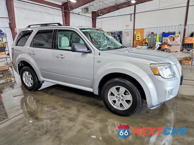 Czwarte zdjęcie samochodu z boku: 2009 MERCURY MARINER VIN:4M2CU81G29KJ23144 - miniatura