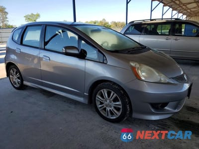 Czwarte zdjęcie samochodu z boku: 2009 HONDA FIT SPORT VIN:JHMGE88499S032404 - miniatura