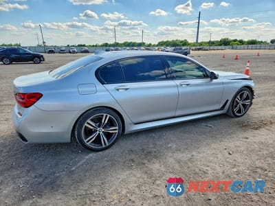 Trzecie zdjęcie samochodu z tyłu: 2019 BMW 750 I VIN:WBA7F0C5XKGM24801 - miniatura