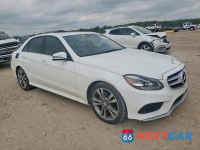 Czwarte zdjęcie samochodu z boku: 2014 MERCEDES-BENZ E 350 4MATIC VIN:WDDHF8JBXEA981719 - miniatura