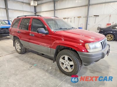Czwarte zdjęcie samochodu z boku: 2002 JEEP GRAND CHEROKEE LAREDO VIN:1J4GW48N82C188976 - miniatura