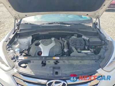 Zdjęcie 12 z 13 samochodu: 2014 HYUNDAI SANTA FE SPORT 2.0T VIN:5XYZWDLA8EG145242 - miniatura