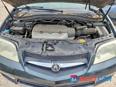Zdjęcie 12 z 13 samochodu: 2003 ACURA MDX TOURING VIN:2HNYD18773H506370 - miniatura