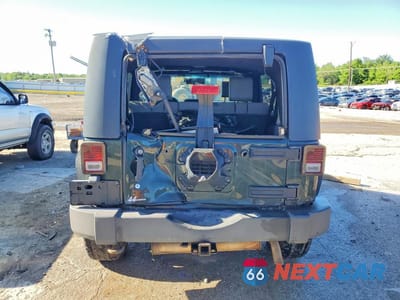 Zdjęcie 6 z 12 samochodu: 2010 JEEP WRANGLER UNLIMITED SPORT VIN:1J4HA3H12AL125218 - miniatura