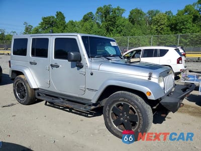 Czwarte zdjęcie samochodu z boku: 2012 JEEP WRANGLER UNLIMITED SAHARA VIN:1C4BJWEG1CL260473 - miniatura