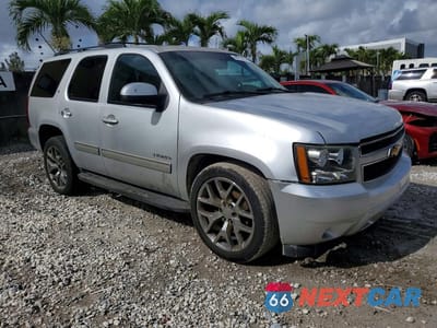 Czwarte zdjęcie samochodu z boku: 2014 CHEVROLET TAHOE C1500 LT VIN:1GNSCBE00ER232662 - miniatura