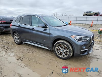 Czwarte zdjęcie samochodu z boku: 2017 BMW X1 XDRIVE28I VIN:WBXHT3C34H5F76017 - miniatura