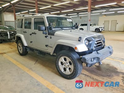 Czwarte zdjęcie samochodu z boku: 2011 JEEP WRANGER VIN:1J4HA7H1XBL612921 - miniatura
