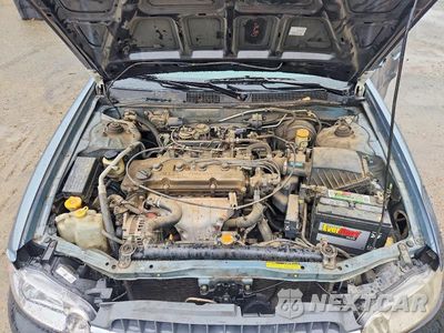 Zdjęcie 11 z 12 samochodu: 2000 NISSAN ALTIMA XE VIN:1N4DL01D6YC217675 - miniatura