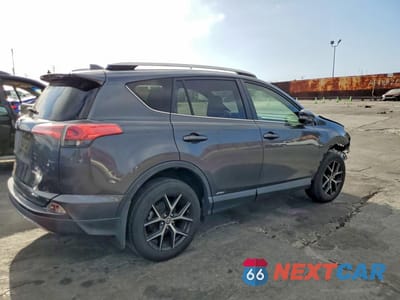 Trzecie zdjęcie samochodu z tyłu: 2018 TOYOTA RAV4 HV SE VIN:JTMJJREV1JD240372 - miniatura