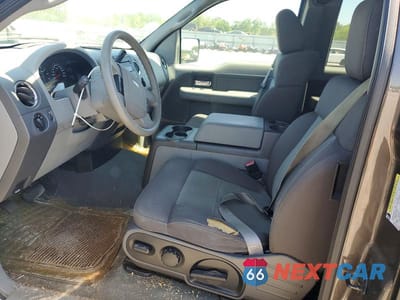 Zdjęcie 7 z 12 samochodu: 2005 FORD F150 VIN:1FTPX02595KD45347 - miniatura