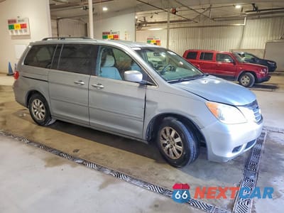 Czwarte zdjęcie samochodu z boku: 2010 HONDA ODYSSEY EX VIN:5FNRL3H57AB100714 - miniatura