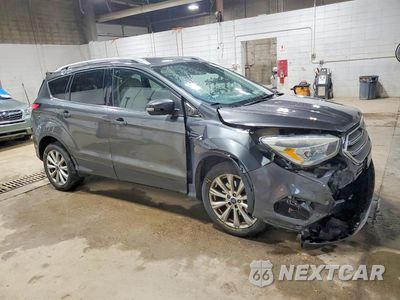 Czwarte zdjęcie samochodu z boku: 2017 FORD ESCAPE TITANIUM VIN:1FMCU0J91HUB56742 - miniatura