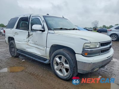 Czwarte zdjęcie samochodu z boku: 2004 CHEVROLET TAHOE K1500 VIN:1GNEK13T14J313528 - miniatura