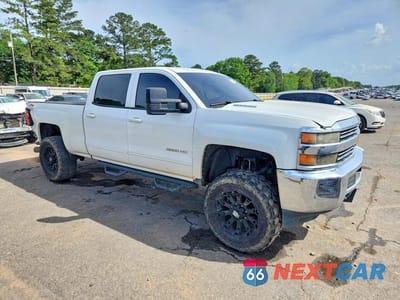 Czwarte zdjęcie samochodu z boku: 2015 CHEVROLET SILVERADO K2500 HEAVY DUTY LT VIN:1GC1KVE86FF565966 - miniatura