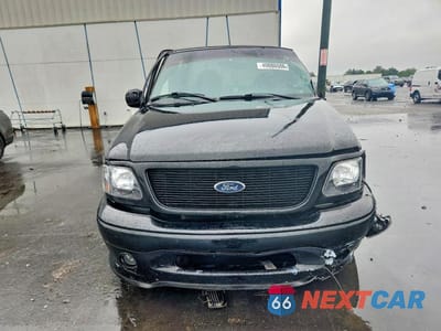 Piąte zdjęcie samochodu w środku: 2000 FORD F150 VIN:2FTRX07L2YCB02326 - miniatura