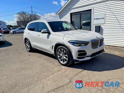 Czwarte zdjęcie samochodu z boku: 2022 BMW X5 XDRIVE45E VIN:5UXTA6C02N9M26931 - miniatura