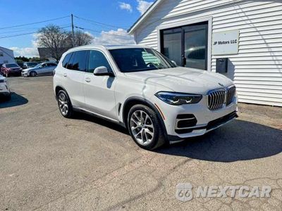 Czwarte zdjęcie samochodu z boku: 2022 BMW X5 XDRIVE45E VIN:5UXTA6C02N9M26931 - miniatura