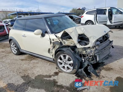 Czwarte zdjęcie samochodu z boku: 2007 MINI COOPER VIN:WMWMF33527TT51488 - miniatura