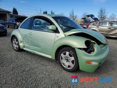 Czwarte zdjęcie samochodu z boku: 1999 VOLKSWAGEN NEW BEETLE GLS VIN:3VWCA21C1XM425729 - miniatura