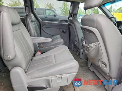 Zdjęcie 11 z 13 samochodu: 2005 DODGE GRAND CARAVAN SXT VIN:2D8GP44L45R160242 - miniatura